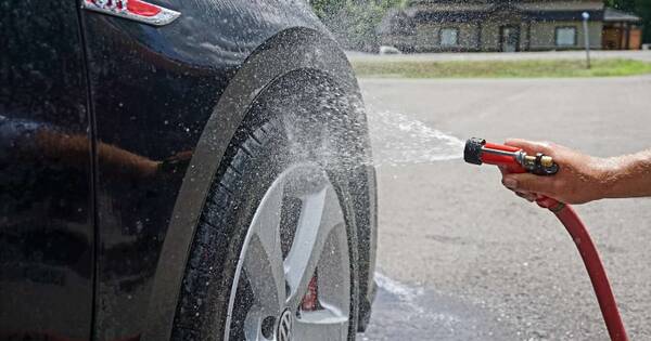 Washing and cleaning vehicles on common property